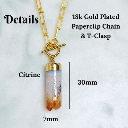 Citrine crystal pendant necklace with a 18k gold-plated paperclip chain and toggle clasp, shown with dimension labels indicating 30mm length and 7mm width on a light marble background.