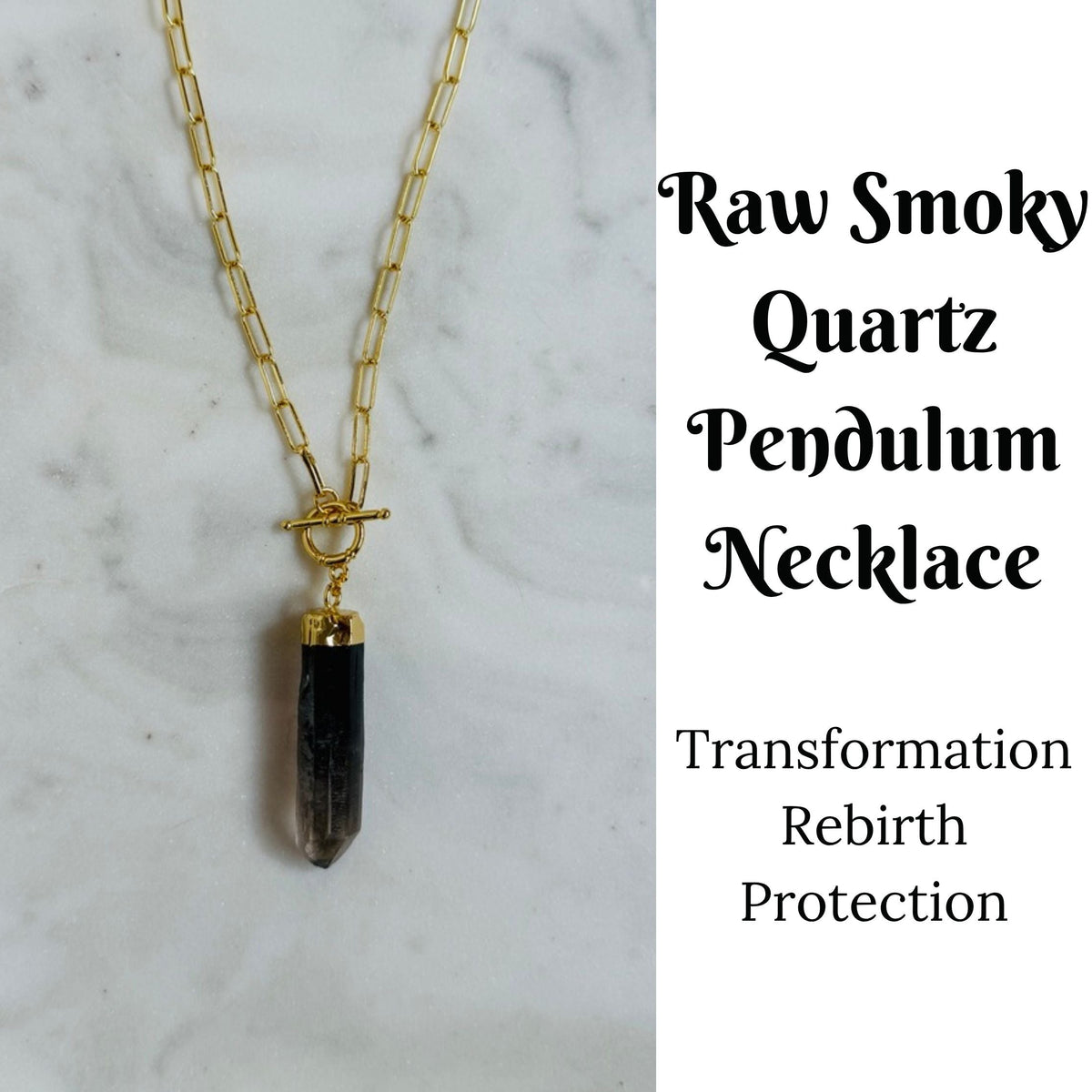 A gold chain necklace with a raw smoky quartz pendant, displayed on a white marble background with text on the right reading 'Raw Smoky Quartz Pendulum Necklace' and 'Transformation Rebirth Protection'.