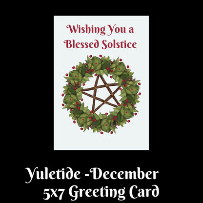 A product listing graphic for a Yuletide December 5x7 greeting card. The card features a white background with a green holly wreath containing a brown pentagram and red berries, with the text 'Wishing You a Blessed Solstice' in red.
